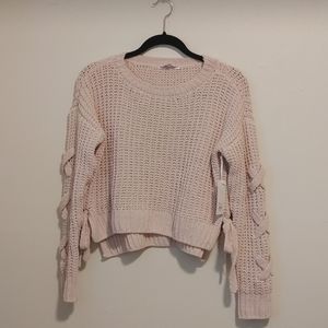 Pink cropped knit sweater